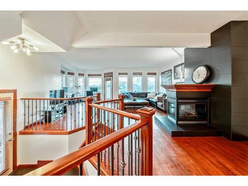 212 12A Street Ne, Calgary, AB - Indoor With Fireplace