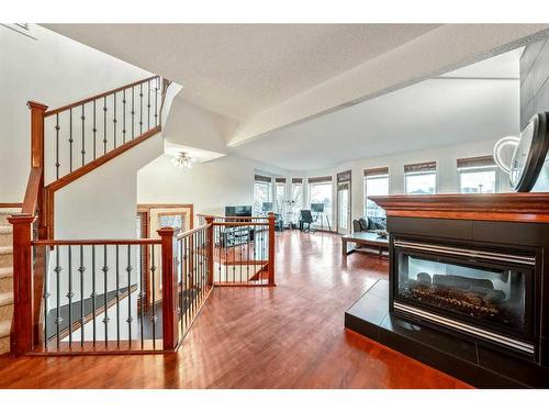 212 12A Street Ne, Calgary, AB - Indoor With Fireplace