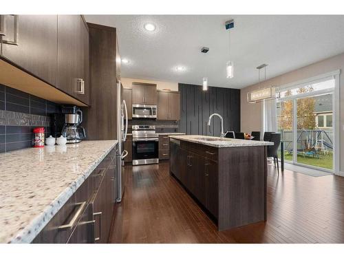 157 Aspenmere Drive, Chestermere, AB - Indoor Photo Showing Kitchen With Stainless Steel Kitchen With Upgraded Kitchen