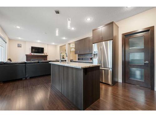 157 Aspenmere Drive, Chestermere, AB - Indoor Photo Showing Kitchen With Stainless Steel Kitchen With Upgraded Kitchen