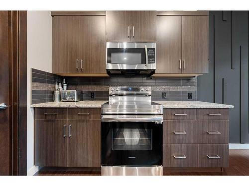 157 Aspenmere Drive, Chestermere, AB - Indoor Photo Showing Kitchen