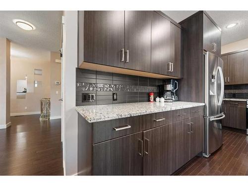 157 Aspenmere Drive, Chestermere, AB - Indoor Photo Showing Kitchen With Stainless Steel Kitchen With Upgraded Kitchen