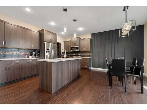 157 Aspenmere Drive, Chestermere, AB - Indoor Photo Showing Kitchen With Upgraded Kitchen