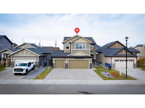 157 Aspenmere Drive, Chestermere, AB - Outdoor With Facade