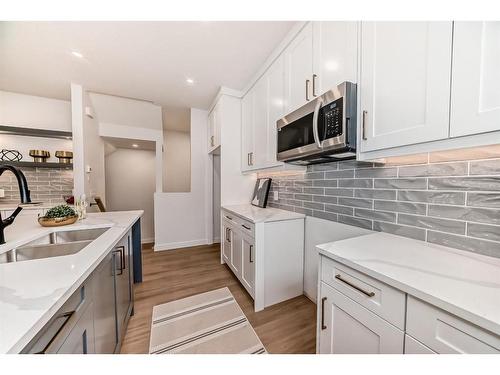 1403 19 Avenue Nw, Calgary, AB - Indoor Photo Showing Kitchen With Double Sink With Upgraded Kitchen