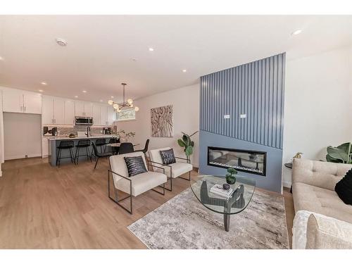 1403 19 Avenue Nw, Calgary, AB - Indoor Photo Showing Living Room With Fireplace