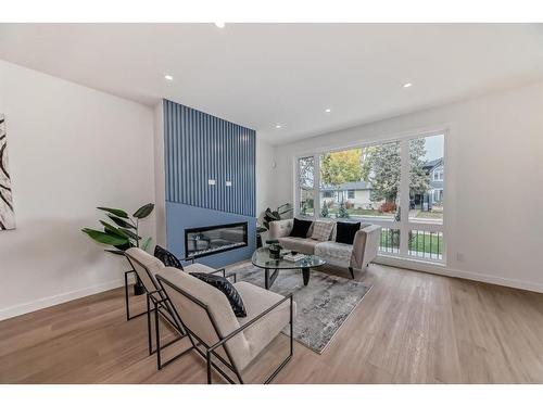 1403 19 Avenue Nw, Calgary, AB - Indoor Photo Showing Living Room With Fireplace