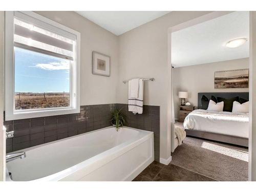 77 Fireside Cove, Cochrane, AB - Indoor Photo Showing Bathroom