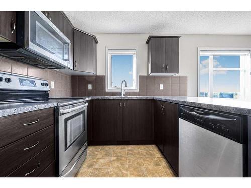 194 Cityscape Common Ne, Calgary, AB - Indoor Photo Showing Kitchen With Double Sink