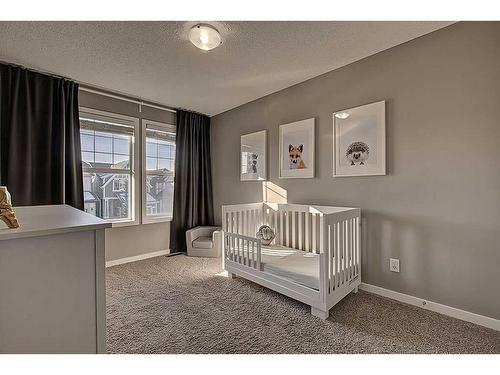 95 Evansridge Crescent Nw, Calgary, AB - Indoor Photo Showing Bedroom