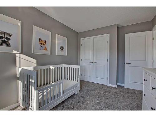 95 Evansridge Crescent Nw, Calgary, AB - Indoor Photo Showing Bedroom