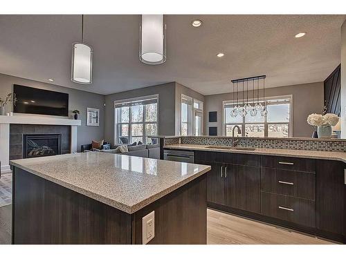 95 Evansridge Crescent Nw, Calgary, AB - Indoor Photo Showing Kitchen With Fireplace