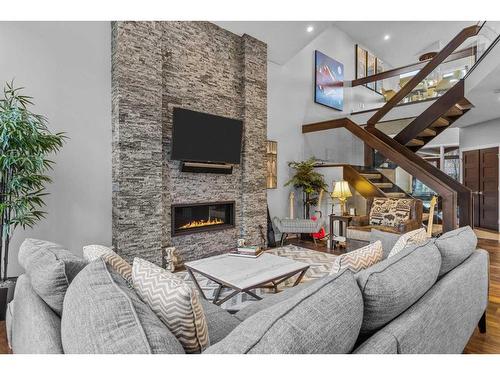 417 Stewart Creek Close, Canmore, AB - Indoor Photo Showing Living Room With Fireplace