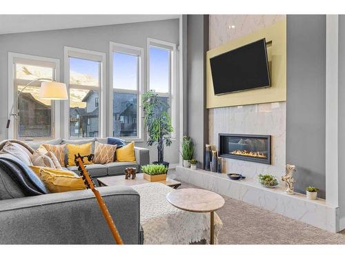 417 Stewart Creek Close, Canmore, AB - Indoor Photo Showing Living Room With Fireplace