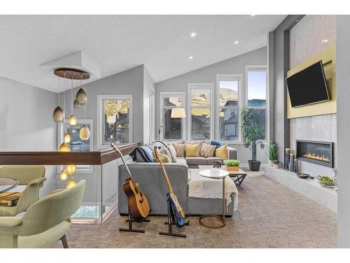 417 Stewart Creek Close, Canmore, AB - Indoor Photo Showing Living Room With Fireplace