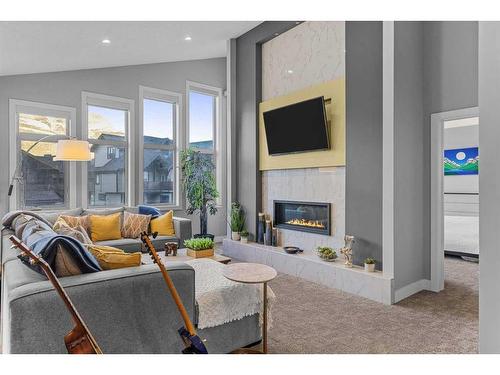 417 Stewart Creek Close, Canmore, AB - Indoor Photo Showing Living Room With Fireplace