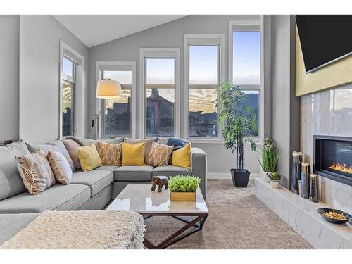 417 Stewart Creek Close, Canmore, AB - Indoor Photo Showing Living Room With Fireplace