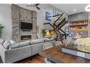 417 Stewart Creek Close, Canmore, AB  - Indoor Photo Showing Living Room With Fireplace 