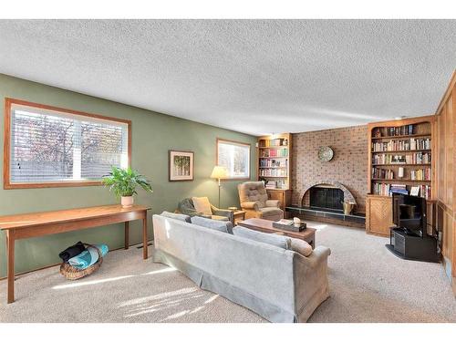 12419 17 Street Sw, Calgary, AB - Indoor Photo Showing Living Room With Fireplace