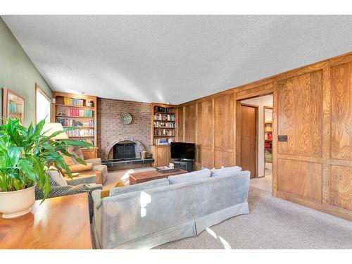 12419 17 Street Sw, Calgary, AB - Indoor Photo Showing Living Room With Fireplace