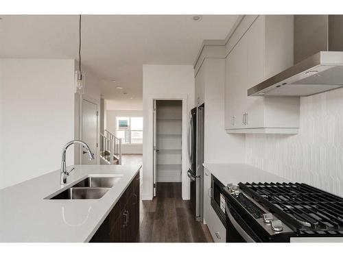 24 Herron Walk Ne, Calgary, AB - Indoor Photo Showing Kitchen With Double Sink