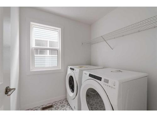 24 Herron Walk Ne, Calgary, AB - Indoor Photo Showing Laundry Room