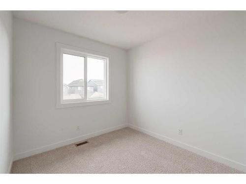 24 Herron Walk Ne, Calgary, AB - Indoor Photo Showing Other Room