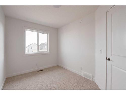 24 Herron Walk Ne, Calgary, AB - Indoor Photo Showing Other Room