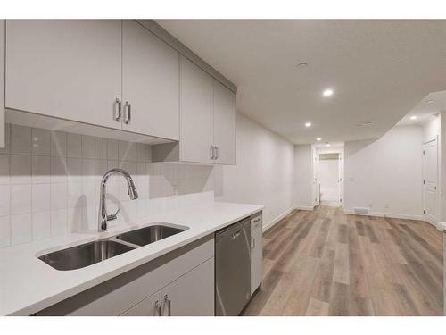 24 Herron Walk Ne, Calgary, AB - Indoor Photo Showing Kitchen With Double Sink