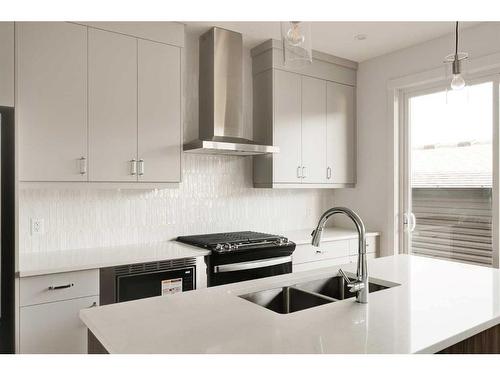 24 Herron Walk Ne, Calgary, AB - Indoor Photo Showing Kitchen With Double Sink With Upgraded Kitchen