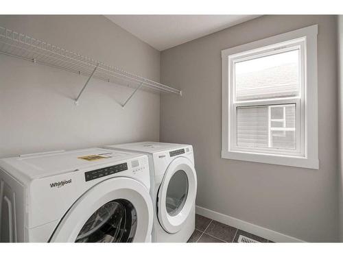 28 Herron Walk Ne, Calgary, AB - Indoor Photo Showing Laundry Room