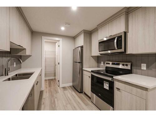 28 Herron Walk Ne, Calgary, AB - Indoor Photo Showing Kitchen With Double Sink With Upgraded Kitchen