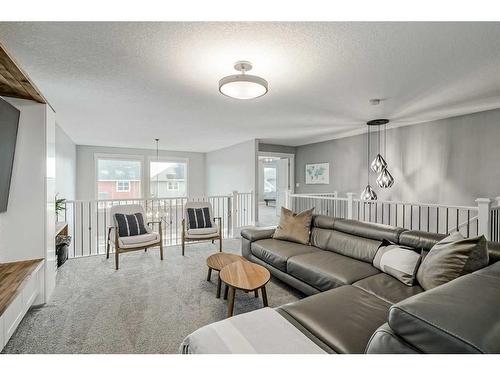 34 Auburn Shores Cape Se, Calgary, AB - Indoor Photo Showing Living Room