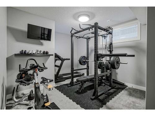 34 Auburn Shores Cape Se, Calgary, AB - Indoor Photo Showing Gym Room