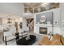 34 Auburn Shores Cape Se, Calgary, AB  - Indoor Photo Showing Living Room With Fireplace 