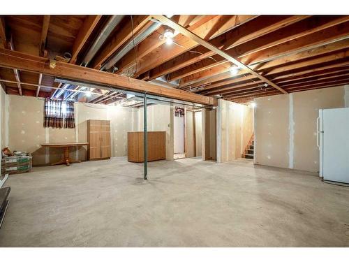 2408 26 Street, Nanton, AB - Indoor Photo Showing Basement