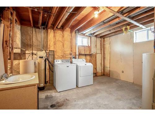 2408 26 Street, Nanton, AB - Indoor Photo Showing Laundry Room