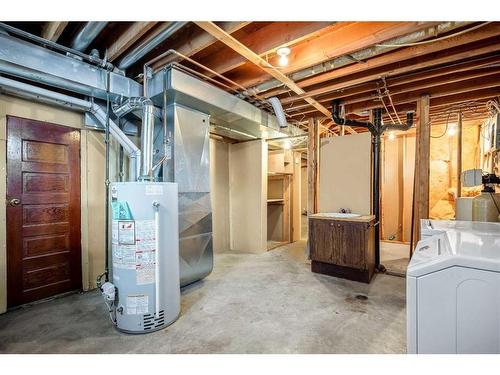 2408 26 Street, Nanton, AB - Indoor Photo Showing Laundry Room