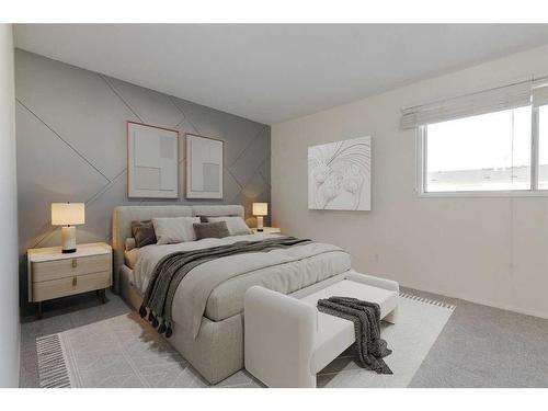 42-100 Pennsylvania Road Se, Calgary, AB - Indoor Photo Showing Bedroom