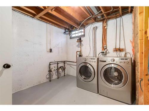 42-100 Pennsylvania Road Se, Calgary, AB - Indoor Photo Showing Laundry Room