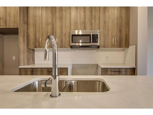 269 Royal Elm Road Nw, Calgary, AB - Indoor Photo Showing Kitchen With Double Sink