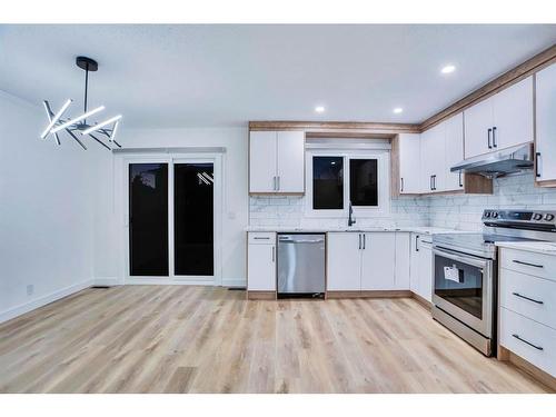 58 Castleglen Road Ne, Calgary, AB - Indoor Photo Showing Kitchen