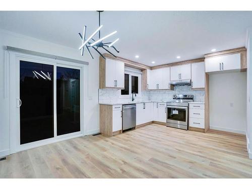 58 Castleglen Road Ne, Calgary, AB - Indoor Photo Showing Kitchen