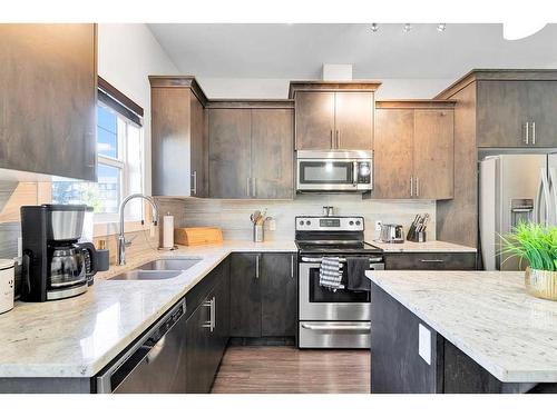 106 Skyview Ranch Grove Ne, Calgary, AB - Indoor Photo Showing Kitchen With Double Sink With Upgraded Kitchen