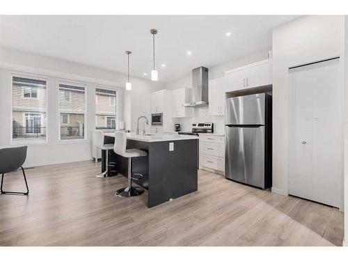 443 South Point Lane Sw, Airdrie, AB - Indoor Photo Showing Kitchen With Stainless Steel Kitchen With Upgraded Kitchen