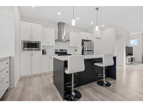 443 South Point Lane Sw, Airdrie, AB - Indoor Photo Showing Kitchen With Stainless Steel Kitchen With Upgraded Kitchen