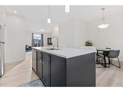 443 South Point Lane Sw, Airdrie, AB - Indoor Photo Showing Kitchen With Upgraded Kitchen