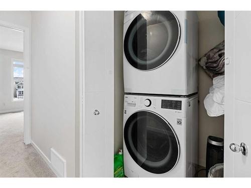 443 South Point Lane Sw, Airdrie, AB - Indoor Photo Showing Laundry Room