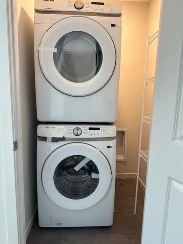 74 Sage Hill Lane Nw, Calgary, AB - Indoor Photo Showing Laundry Room