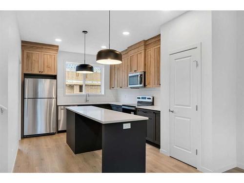 74 Sage Hill Lane Nw, Calgary, AB - Indoor Photo Showing Kitchen With Stainless Steel Kitchen With Upgraded Kitchen